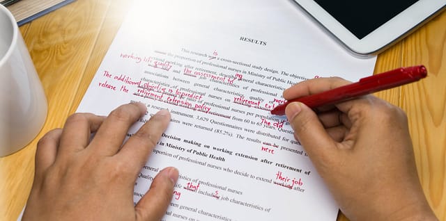 a person reviewing his or her written document